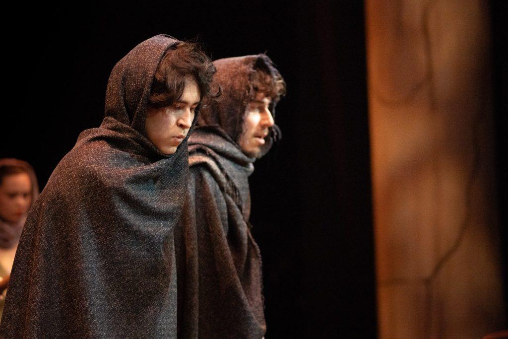 Juniors Josh Wilson (left) and Nathan Skenderian (right) perform a scene together as Pylades and Orestes during a dress rehearsal in Lindhurst Theatre on Jan. 26. Wilson said the two characters pretend to be sent to the sea for sacrifice, when in reality they are about to try to make their escape.