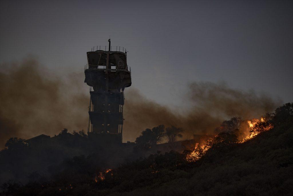 The Palisades Fire moves toward a structure on the hillside. The fire burned over 23,700 acres. Photo courtesy of Ryan Bough