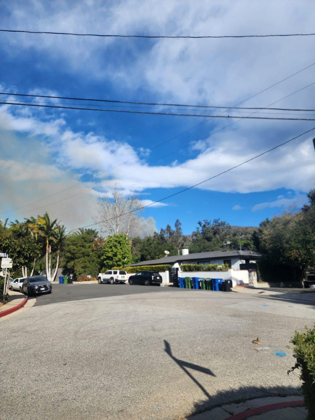 Smoke builds behind the Ace of Hearts Dog Rescue in Pacific Palisades during the recent Palisades Fire. The office was also the home of the Ace of Hearts Dog Rescue owner. Photo courtesy of Jackie Mullaney