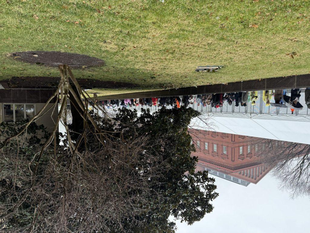 Thousands of Trump's supporters waited in line for hours Sunday, Jan. 19 in the rain outside the Capital One Arena. Over 220,000 people received tickets for the outdoor inauguration, the stadium only held 20,000, not including security. Photos by Rachel Flynn