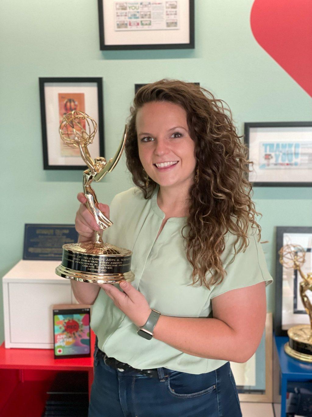 2016 alumna Lexie Tankersley posing with her Emmy. She said winning the Emmy was astounding. Photo courtesy of Lexie Tankersley.