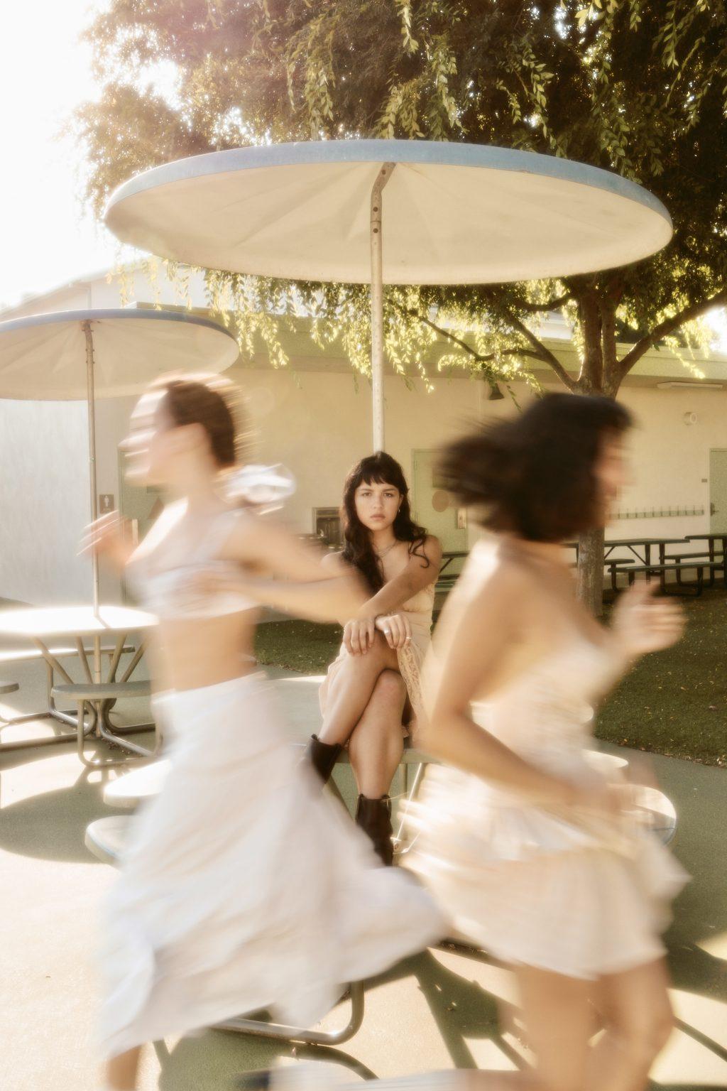 Models Ava Carbonara, Jordan Delgado and Saskia Curry are directed by Cheung in a photoshoot at Cheung’s local elementary school July 2023. Cheung did this photoshoot as part of a sponsorship with Canon and said her focus was on girlhood.