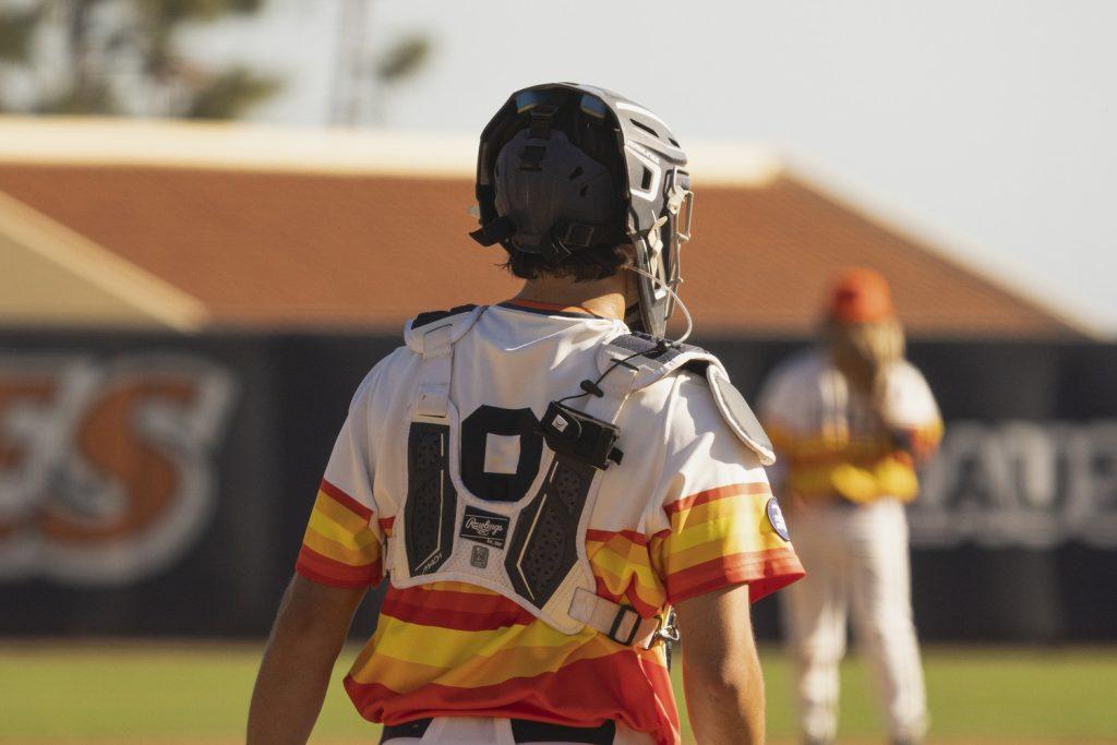 Junior catcher Max Aude looks onwards after calling a play for this team against the Gauchos on Feb. 25 at Eddy D. Field Stadium. Aude said moving forward, the team needs to work as a collective, with both pitching and offense coming together.