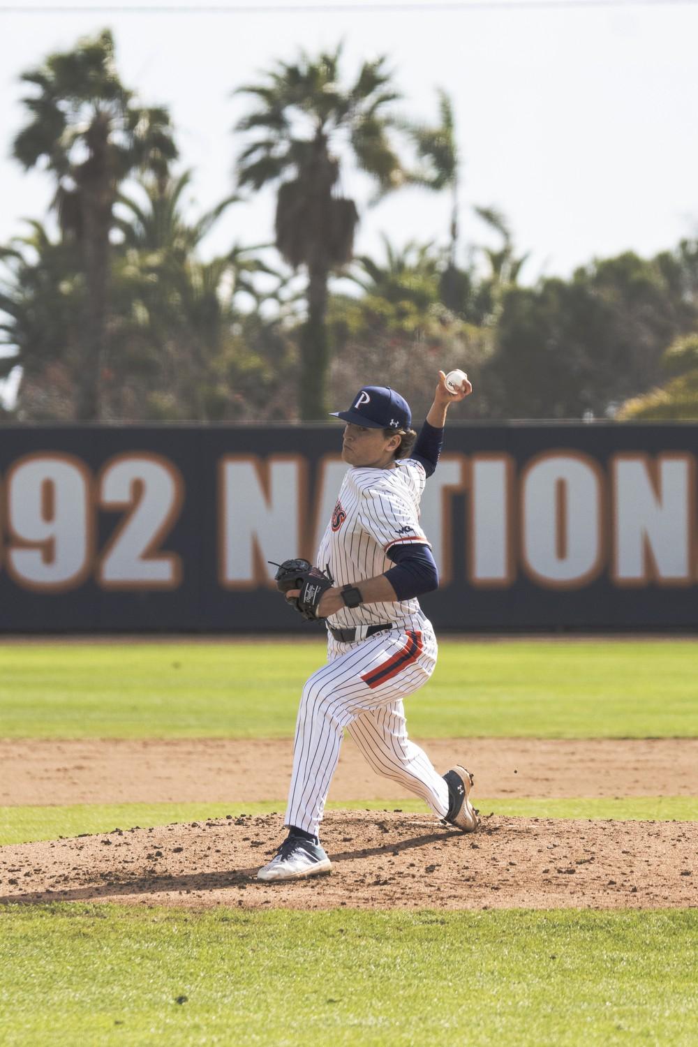 Tommy Scavone, redshirt junior right-handed pitcher, prepares to throw a pitch against the Utes on Feb. 14, at Eddy D. Field Stadium. Scavone appeared in nine games last season for the Waves, striking out 34 batters across 32.2 innings pitched.