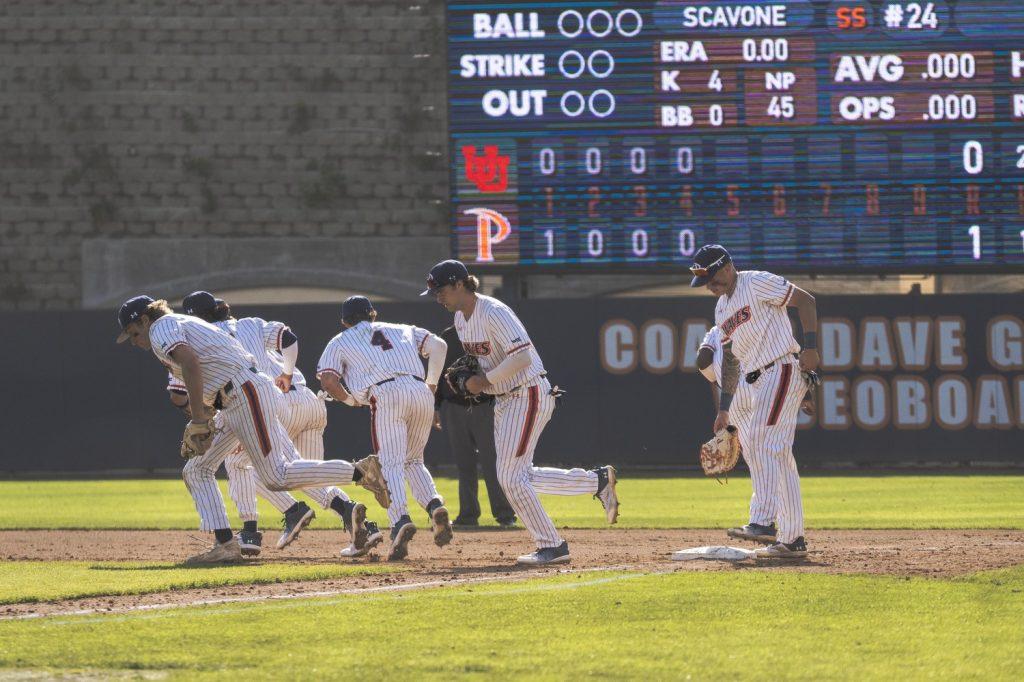 Pepperdine prepares to take the field in the top of the fifth inning at Eddy D. Field Stadium on Feb. 14. Pepperdine's defense only allowed University of Utah one run through nine innings. Photos by Kasten Grimm