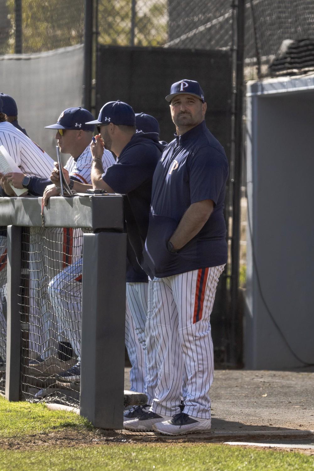 LaTorre alongside his coaching staff during the 2025 home opener against Utah on Feb. 14, at Eddy D. Field Stadium. He said one of the team's strengths this season is the coaching staff.