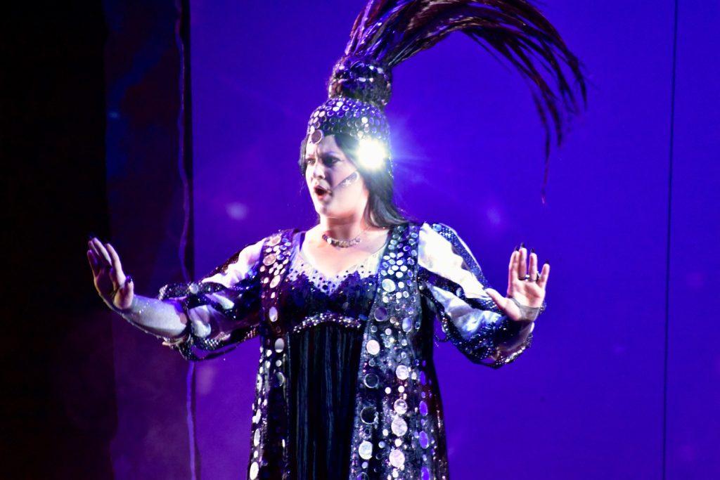 The Queen of the Night, played by senior Claire Atchinson, sparkles in her reflective black dress during a Feb. 25 dress rehearsal. The Queen is one of the villains of "The Magic Flute."