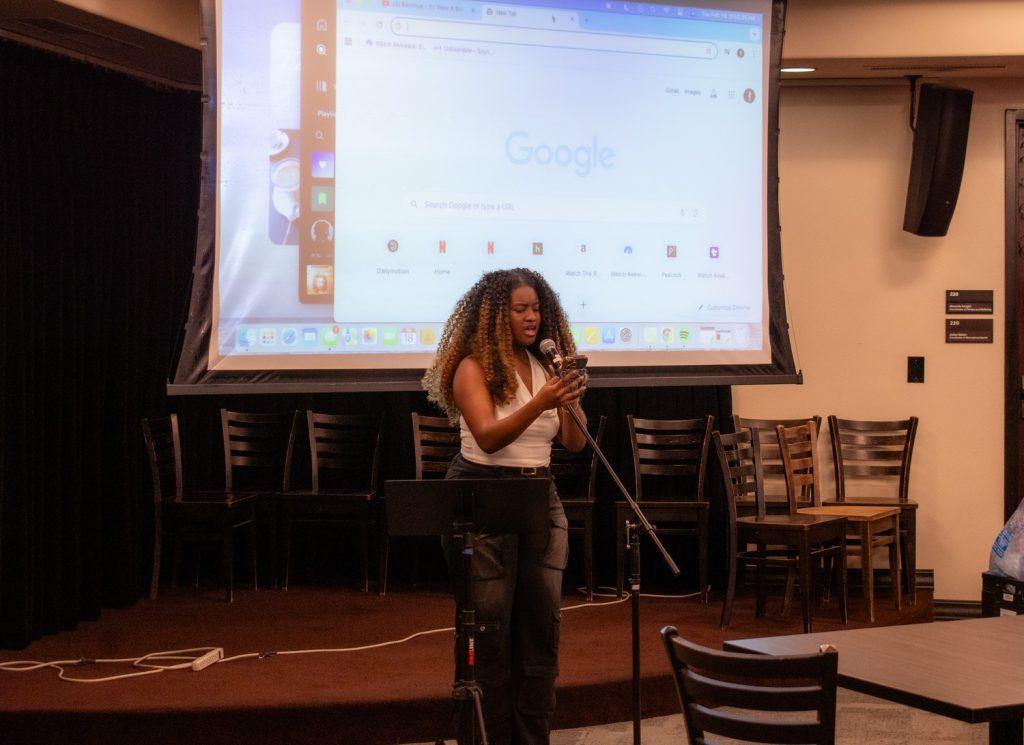 First-year, Zenae Demery, depicted delivering a poem during the BSA showcase