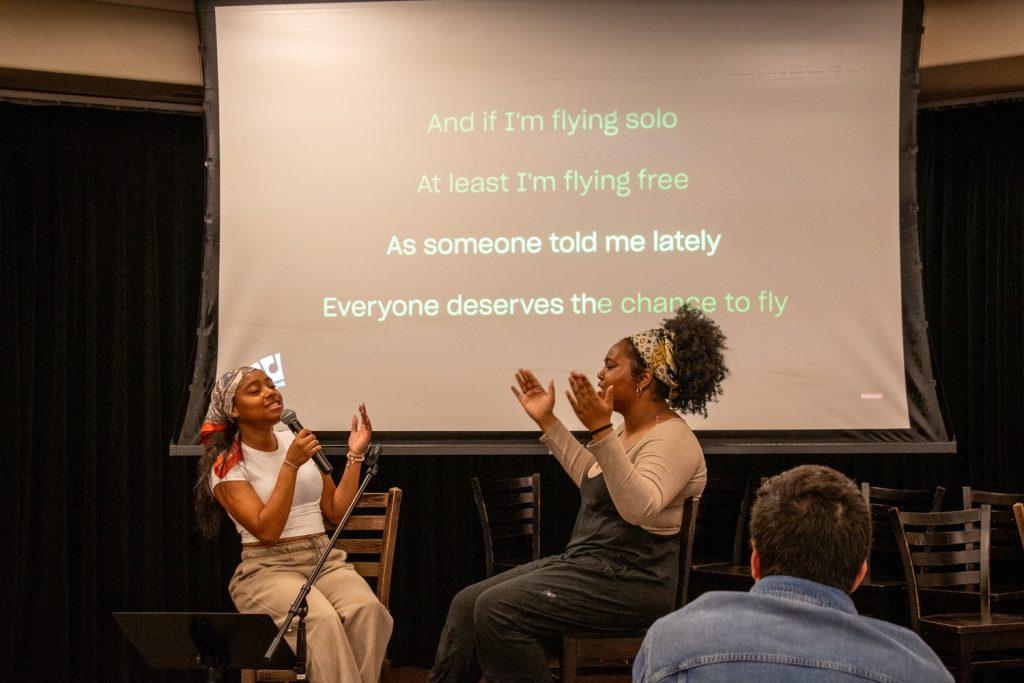 Tori Pradia and Turner-Montgomery pictured performing a duet of Wicked 2&squot;s "Defying Gravity".