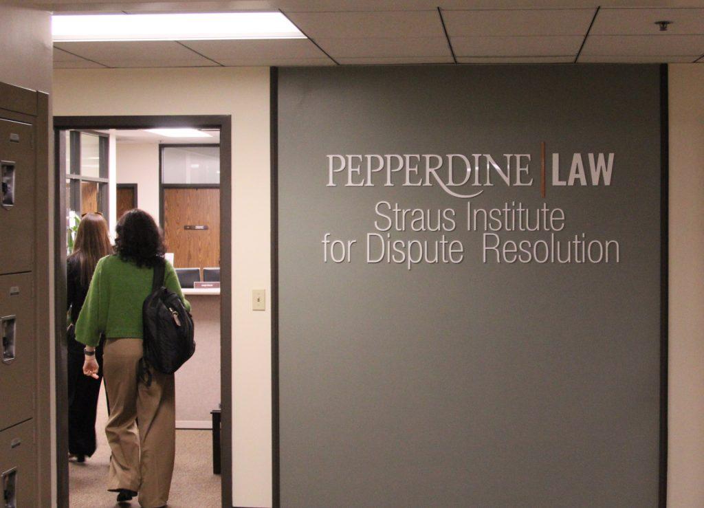 Straus employees enter the office, located in Caruso. Straus is ranked No. 2 in the U.S. News and World Report for Best Dispute Resolution Law Programs.