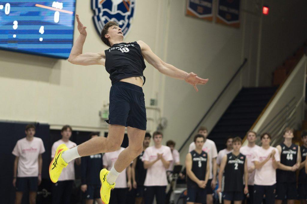 Freshman outside hitter Cole Hartke serving the ball against Dominican University New York on Feb. 9 at Firestone Fieldhouse. Hartke has 13 aces on the season.