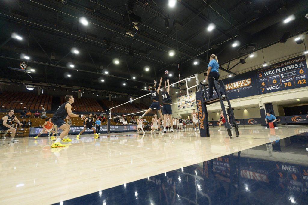 Eadie and redshirt freshman opposite Matt Mazur jumping for the block against Dominican University New York on Feb. 9 at Firestone Fieldhouse. Eadie and Mazur combined for a total of five blocks in the game.