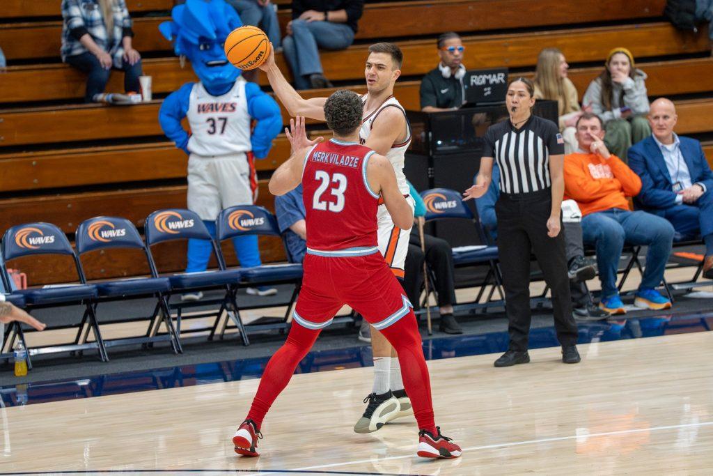 Stefan Todorovic holds the ball against Loyola Marymount University on Feb. 11 at Firestone Fieldhouse. Todorovic leads Pepperdine in average points per game with 18.8.