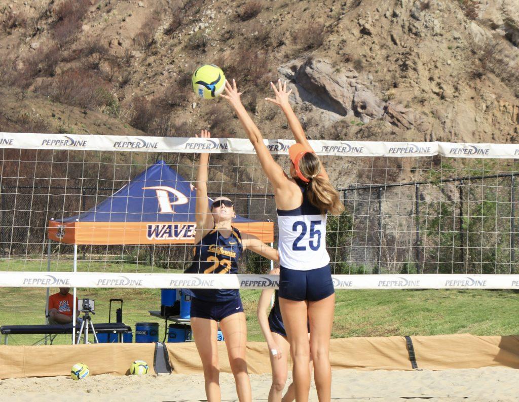 Perez goes for the block against Bakersfield on Feb. 21 at the Pepperdine Beach Courts. Perez was named to the WCC All-Freshman team in 2023 and the All-WCC second team in 2024.