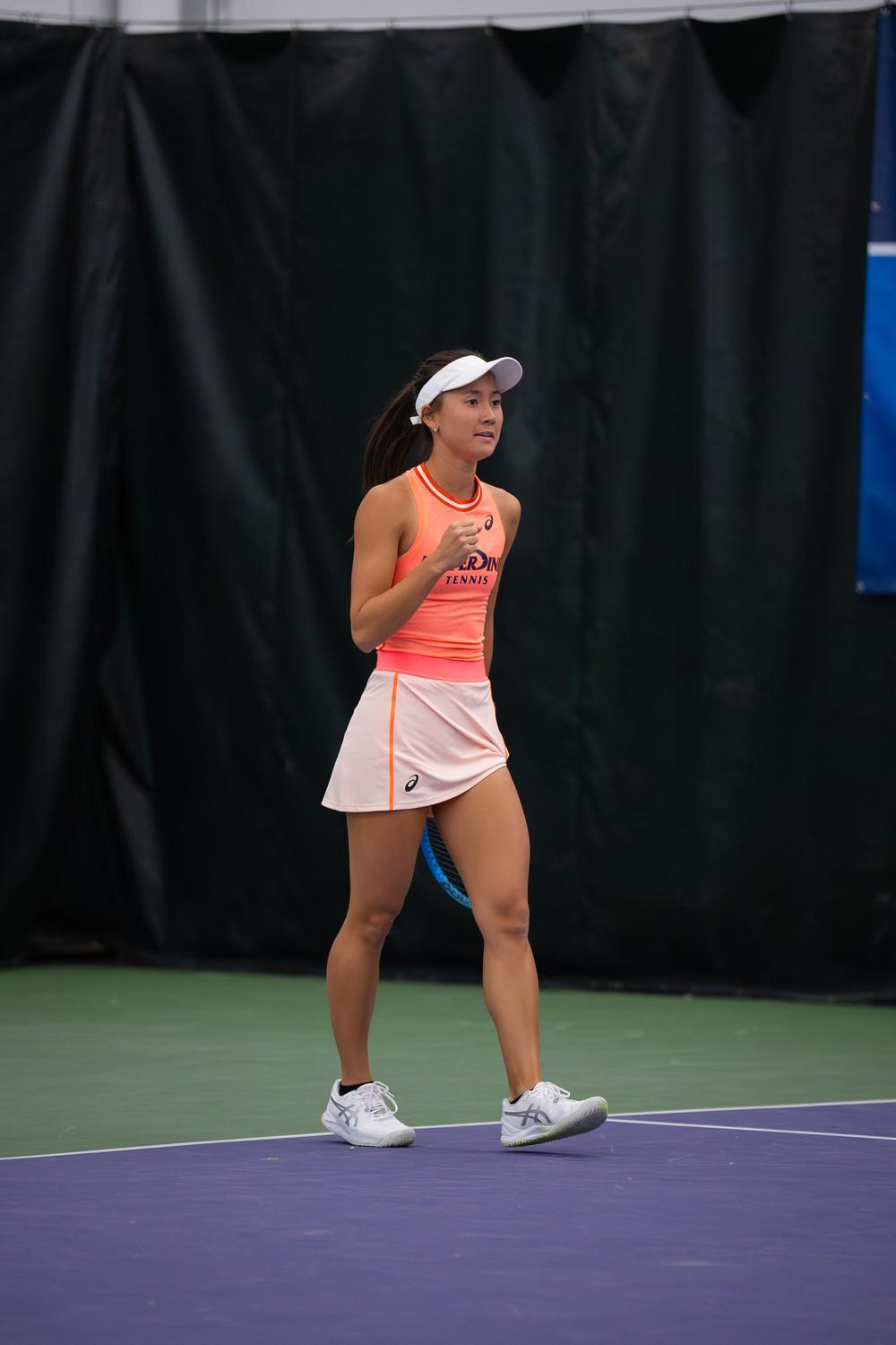 Freshman Alexia Harmon celebrates her point against North Carolina, showing a team effort as she competes in the doubles division alongside freshman Anastasiia Grechkina on Feb. 7 at Combe Tennis Center. Harmon and Grechkina's win contributed to Pepperdine's run but failed to take over overall.