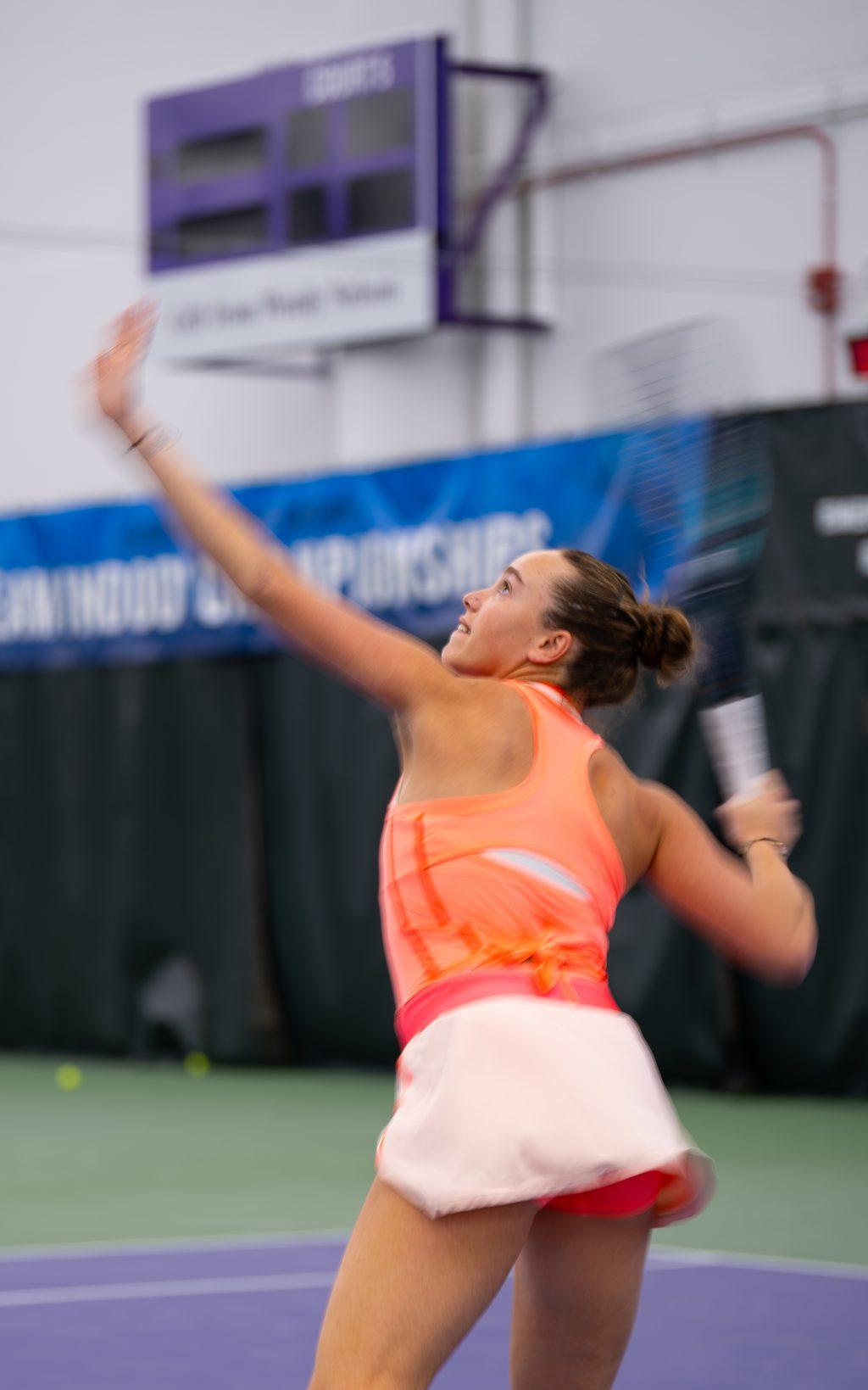 Freshman Liam Oved prepares to receive her North Carolina opponent at Combe Tennis Center on Feb. 7, focusing her sight on the coming ball. With an unfortunate loss, Oved finished with a score of 6-3, 6-0.