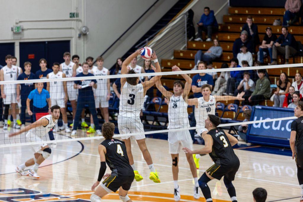 Graduate setter Gabe Dyer sets the ball against Long Beach State on January 26 at Firestone Fieldhouse. Dyer ended the game with 37 assists.