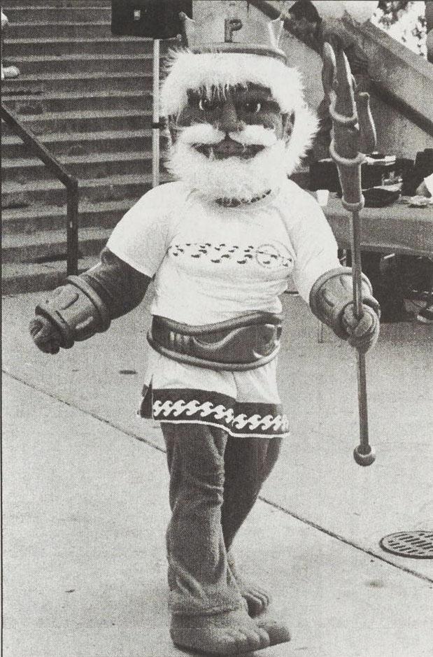 King Neptune walks around campus in 1998 while holding a triton in his left hand and sporting a crown with a capital "P" on it. King Neptune was the first official mascot of Pepperdine to be distinct from Willie. Photo courtesy of Pepperdine Libraries