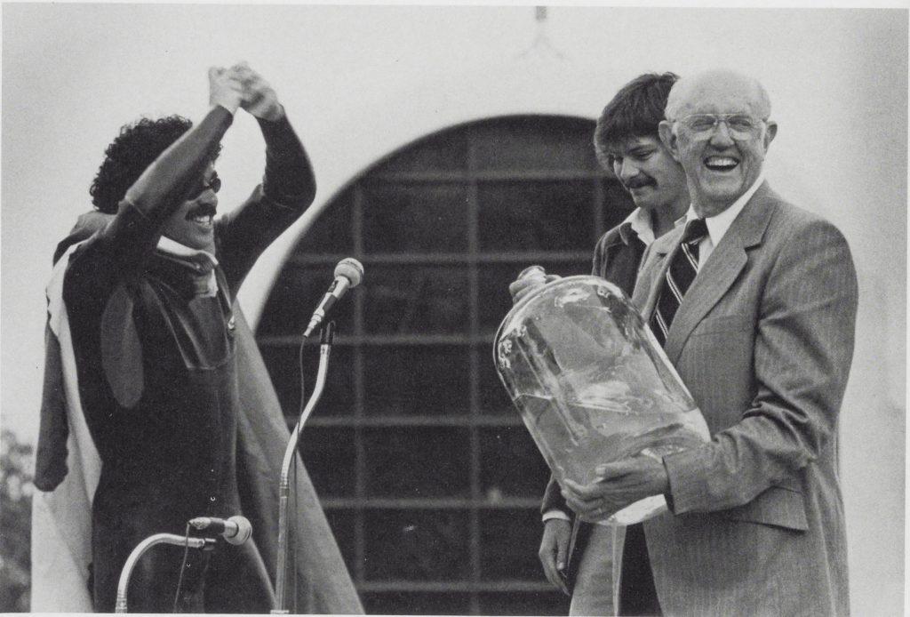 Former Pepperdine University President Howard A. White holds Willie the Wave in 1979. While it's uncertain exactly how long Willie remained in a jug of water, Pepperdine had a new mascot by 1981. Photo courtesy of Pepperdine Libraries