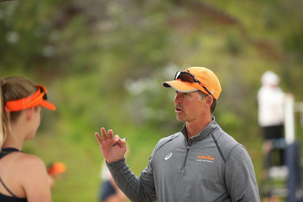 Head Coach Marcio Sicoli coaches the athletes during the beach volleyball season. Through Sicoli’s guidance, the athletes are able to assess the competition during crucial moments of a game and make quick, decisive adjustments. Photo courtesy of Pepperdine Athletics