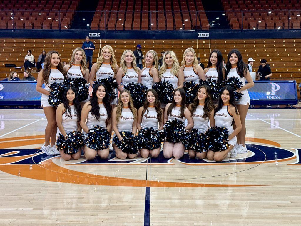 The Pepperdine Cheer Team poses together on media day in Firestone Fieldhouse on Dec. 5. Senior cheerleader Georgia Puckett said the team is comprised of diverse members who all create one perfect team. Photos courtesy of Georgia Puckett