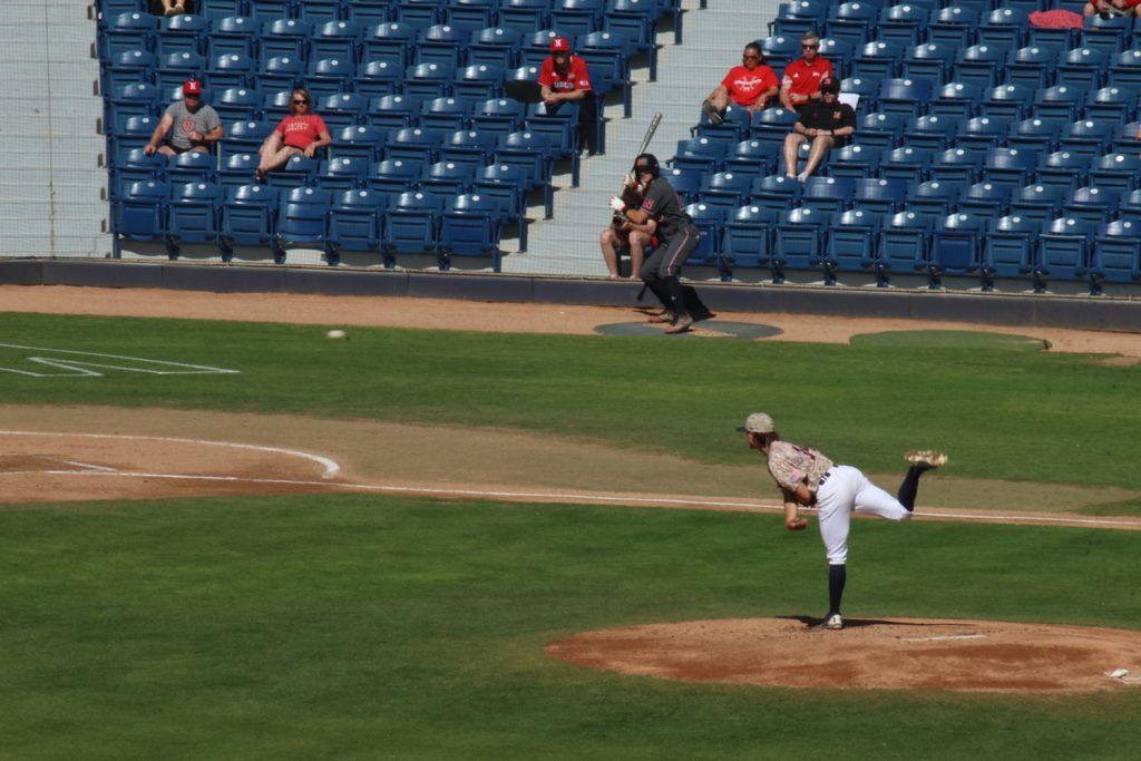 Freshman right-handed pitcher Winston Peterson throws a pitch against the Huskers on March 19 at Eddy D. Field Stadium. Peterson has thrown 2.2 innings this season, with a strikeout. Photo by Griffin Pilcher