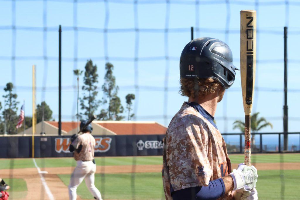 Senior infielder Justin Rubin looks ahead toward the pitcher as he waits on deck against Nebraska on March 19 at Eddy D. Field Stadium. So far, Rubin is batting at a .265 clip. Photo by Griffin Pilcher