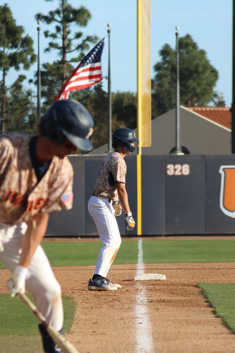 Freshman outfielder Brodey Bitove works a lead at third base as Rubin preps for a pitch against Nebraska on March 19 at Eddy D. Field Stadium. Bitove came into bat for redshirt sophomore Joe Cardinale and went 0-2 with a walk. Photo by Griffin Pilcher