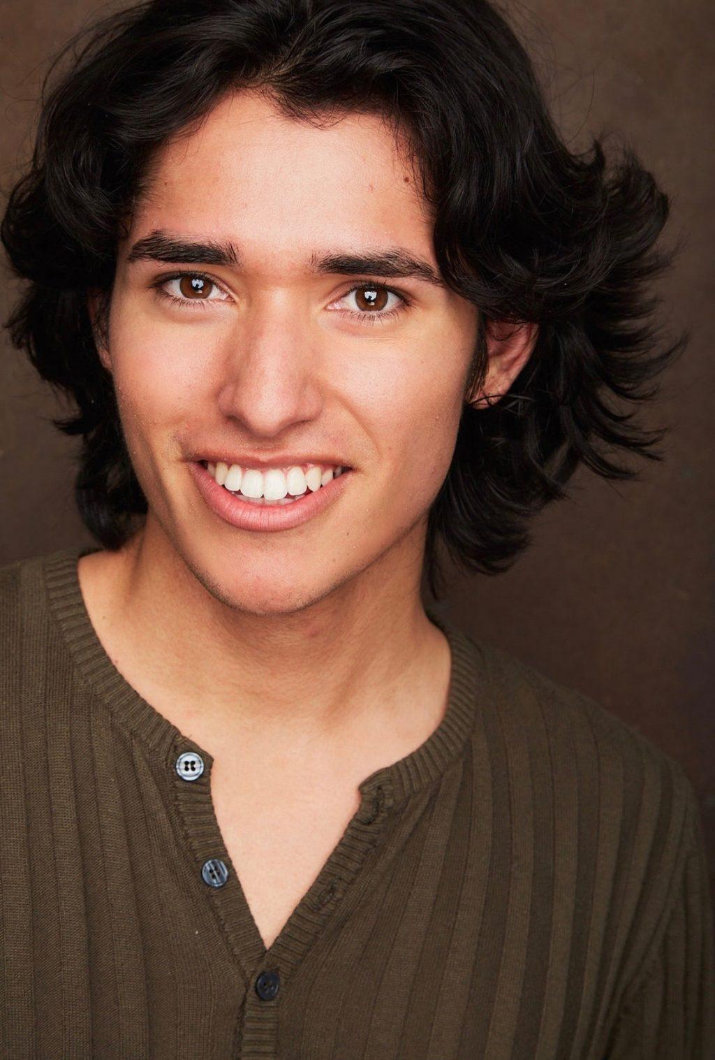 Spencer Williams smiles for his headshot. Williams said he has a passion for TV and film acting alongside his dedication to theatre.