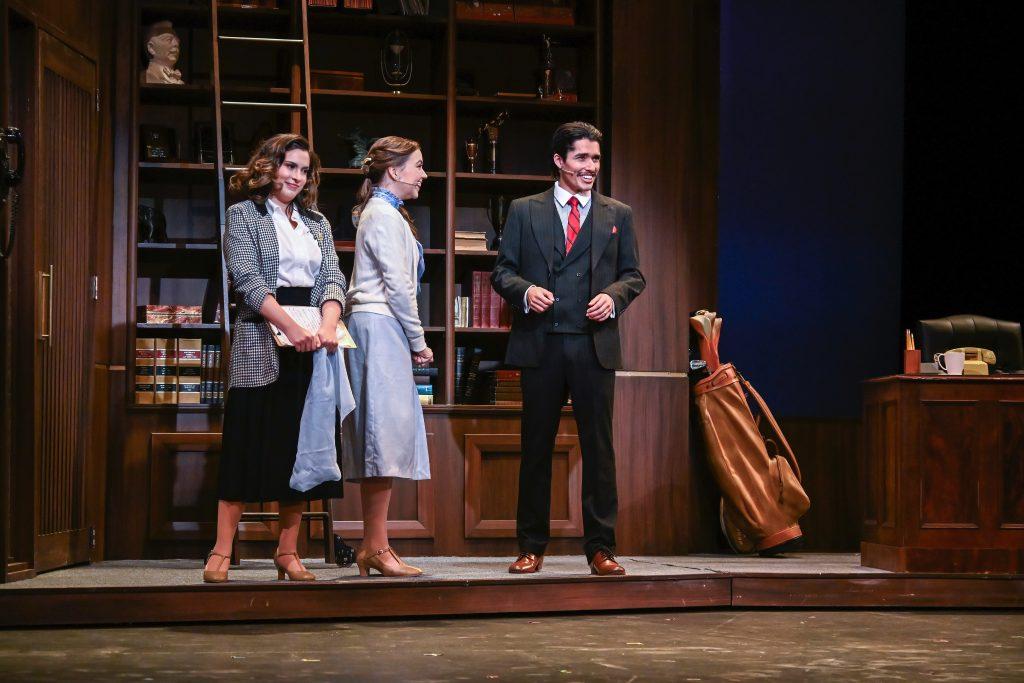 Zoe O&squot;Donnell (left), Tessa Hemphill (middle) and Spencer Williams (right) perform a scene in "9 to 5 The Musical." Williams&squot; character, Franklin Hart, sang a musical number called "Here for You."