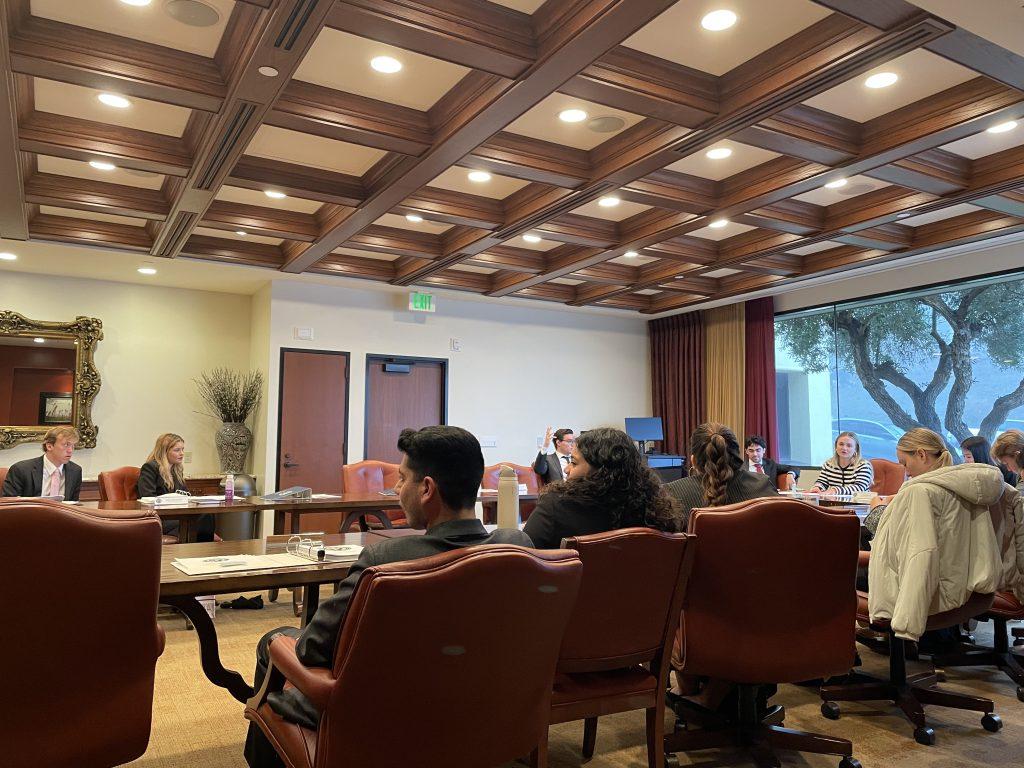 Members of SGA discuss the Student Programming Board general funding request March 12 in the TAC. They voted in a majority to grant the funding request. Photo by Christy Thien