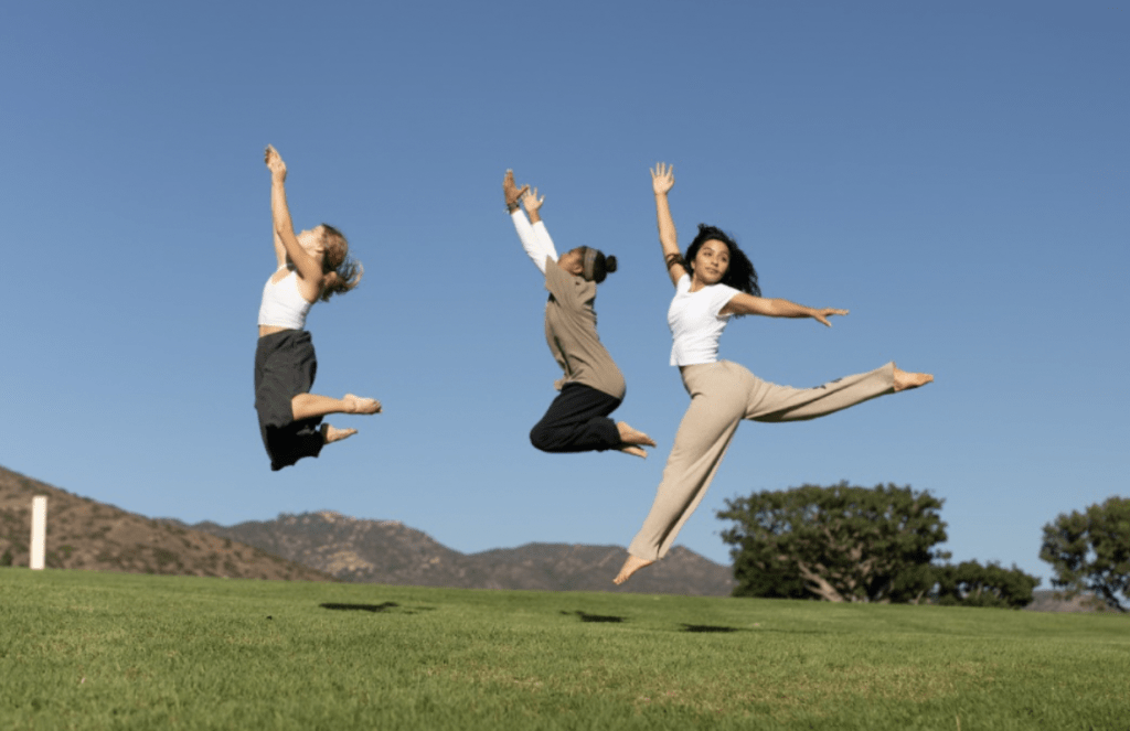 Swan Gerlach, Natalia Grogan and Andrea (Drea) Plascencia (from left to right) worshipping through dance. The women praised God at Alumni Park for a promotional photoshoot. Photo courtesy of Swan Gerlach