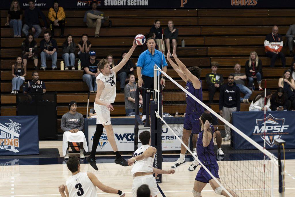 Redshirt freshman opposite Matt Mazur attempts a kill against Grand Canyon University on Feb. 27 at Firestone Fieldhouse. Photos by Kasten Grimm