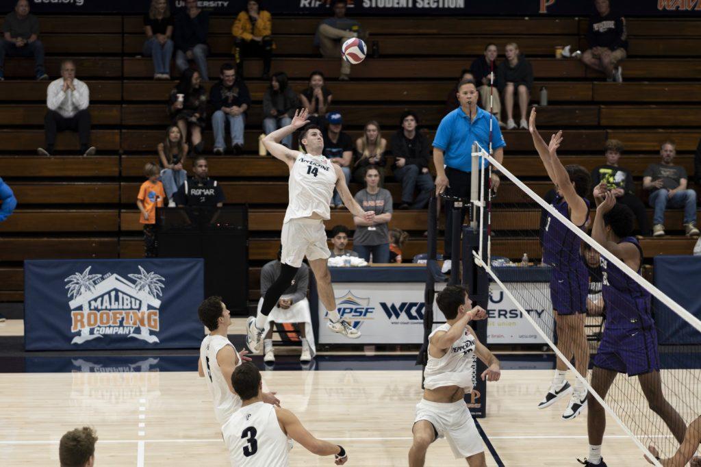 Redshirt junior outside hitter Ryan Barnett jumps for a kill against Grand Canyon University on Feb. 27 at Firestone Fieldhouse. Barnett has registered 127 kills this season.