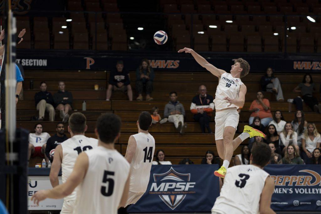 Freshmen outside hitter Cole Hartke spikes the ball against Grand Canyon University on Feb. 27 at Firestone Fieldhouse. Hartke's 18 kills pushed his season total to 127, the second highest amount amongst the Waves.