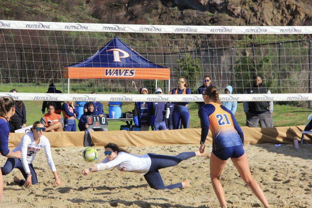 Graduate student Marley Johnson dives for a dig against the against the University of Texas at El Paso on March 15 at the Pepperdine Beach Volleyball Courts. The Waves swept El Paso 5-0 to finish and undefeated weekend. Photo by Guinevere Hesse