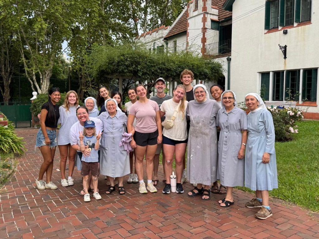 The Buenos Aires International Program spent Feb. 22 volunteering at Benedictines, a monastery located 2.5 blocks from Pepperdine's campus in Argentina. Students spent the day painting the front fence and sharing a meal with the nuns. Photo courtesy of Harmony Hill-Weber