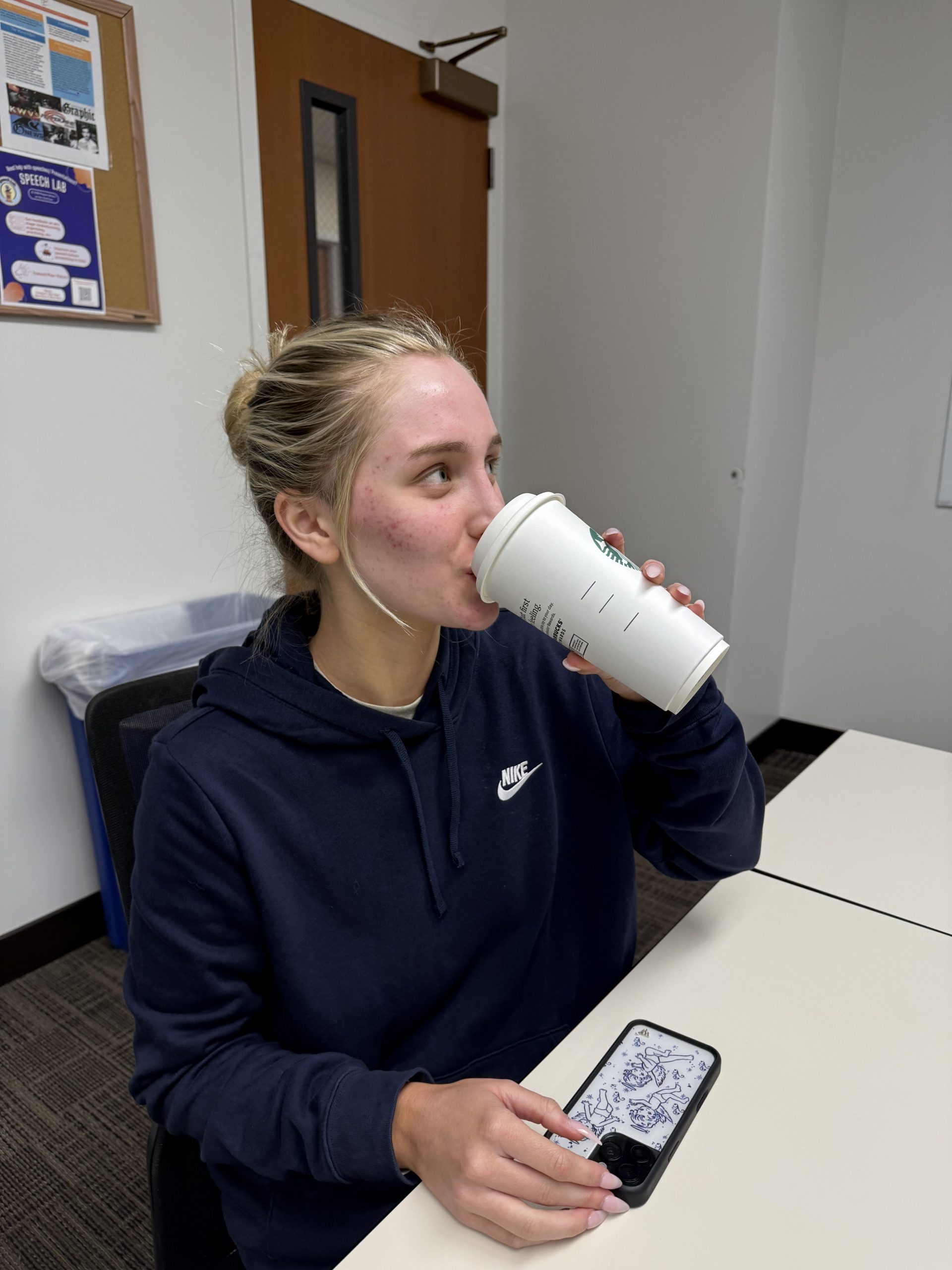 First-year Reagan Augustine drinks a cup of tea from Starbucks in class March 11. She said her favorite type of tea is chamomile.