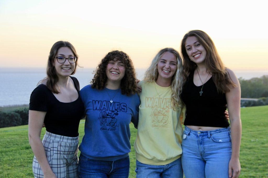 From left to right, seniors Lydia Wolford, Dixie Lovett, Sophia Hilliard and Sharky Smalling pose for a picture at Senior Sunset on Alumni Park on April 7. Seniors said they enjoyed getting to see new and old friends. Photos by Guinevere Hesse