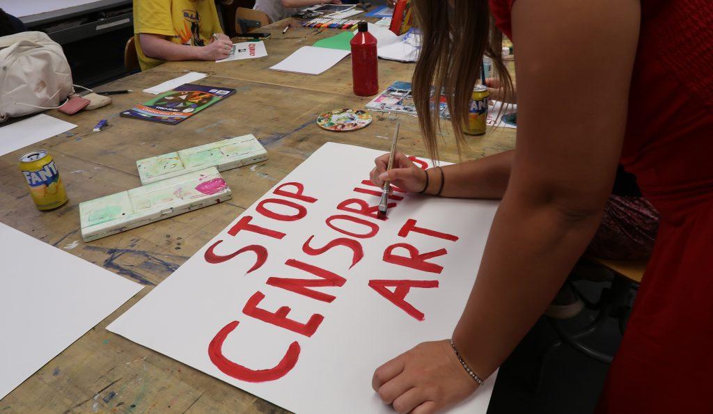 Students create art at the "Angry Art Night" event Oct. 9. Attendees discussed their concerns about their ability to freely express themselves at Pepperdine throughout the event. Photo by Haylie Ross