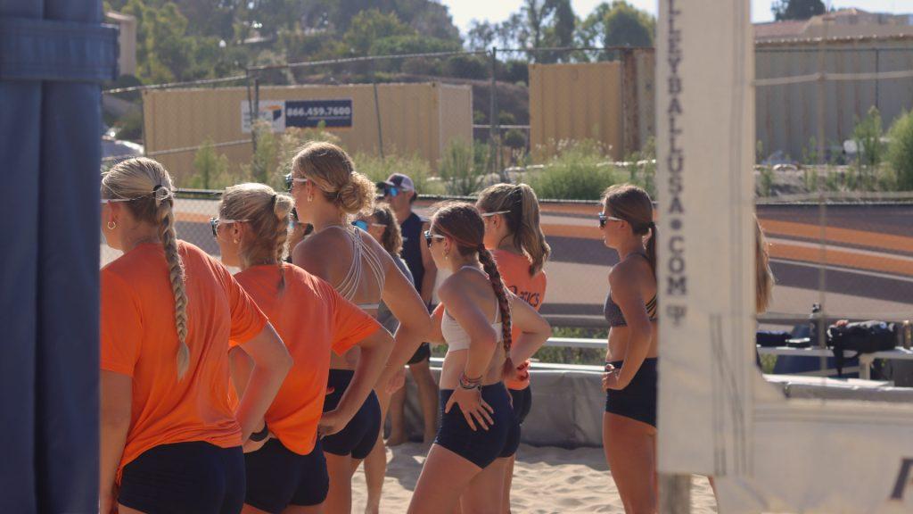 The Waves gather on the sand during a practice at Marie Canyon Courts on Oct. 3. Their focus on raising team spirit and communication throughout the offseason practices was a key theme in preparation for the fall season, Head Coach Marcio Sicoli said.