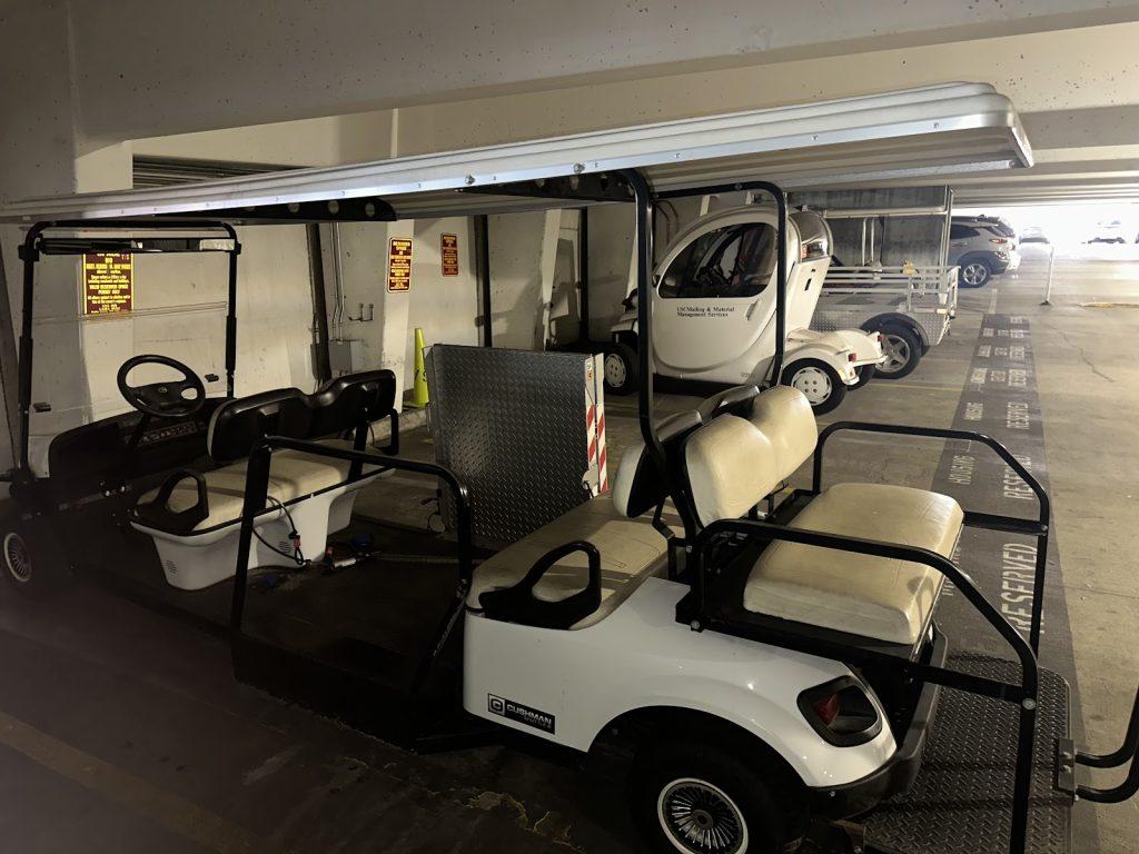 A USC golf cart made for non-collapsible wheelchairs, which helps students with mobility issues, is parked on University of Southern California's campus April 15. The side ramp and middle space allows for the wheelchair to be easily rolled on and off of the cart. Photos by Kaiya Treash