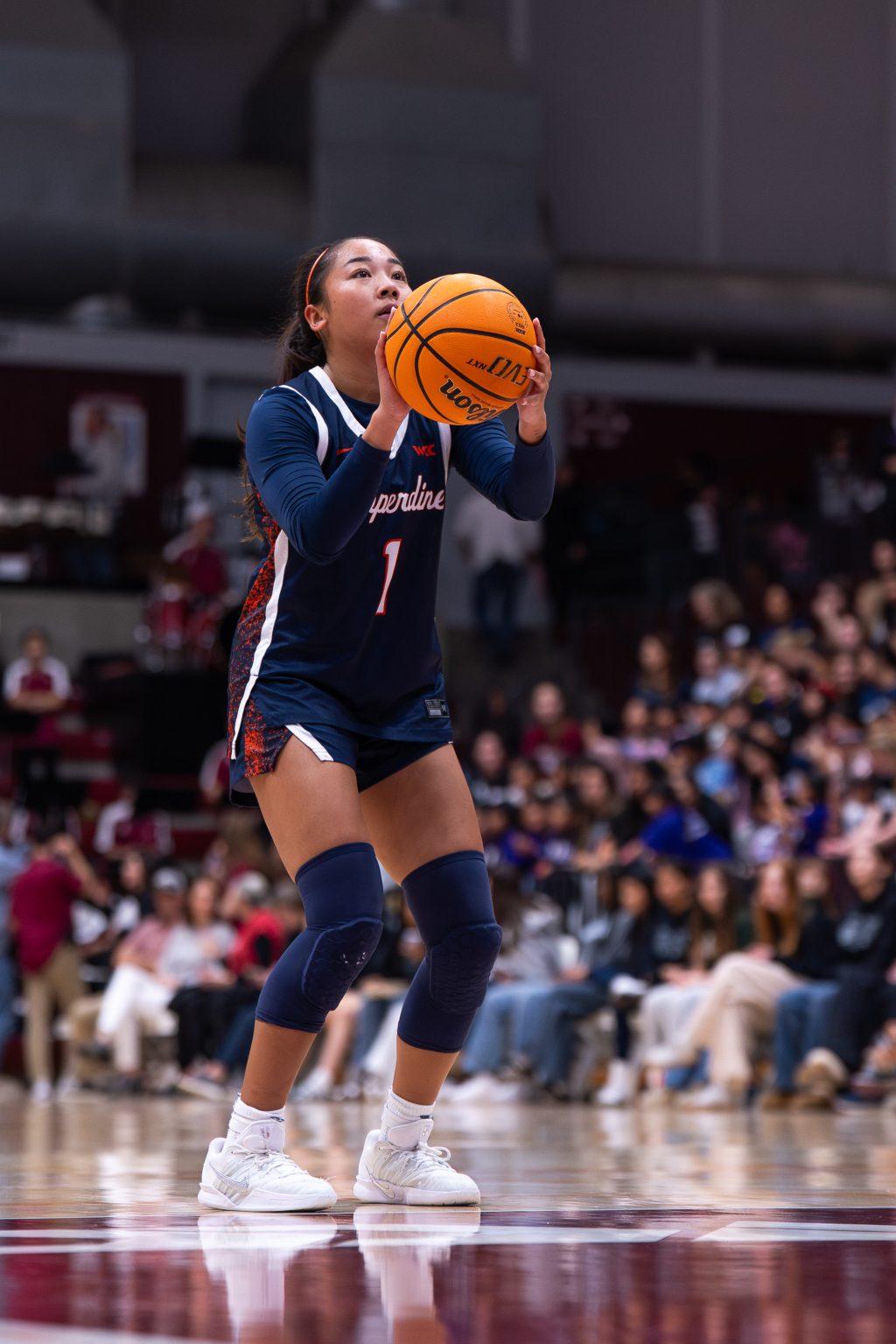 Junior guard Taija Sta. Maria lines up at the free line for two shots on Jan 31. at the Leavey Center. Sta. Maria shot a perfect 3-3 from the charity stripe.