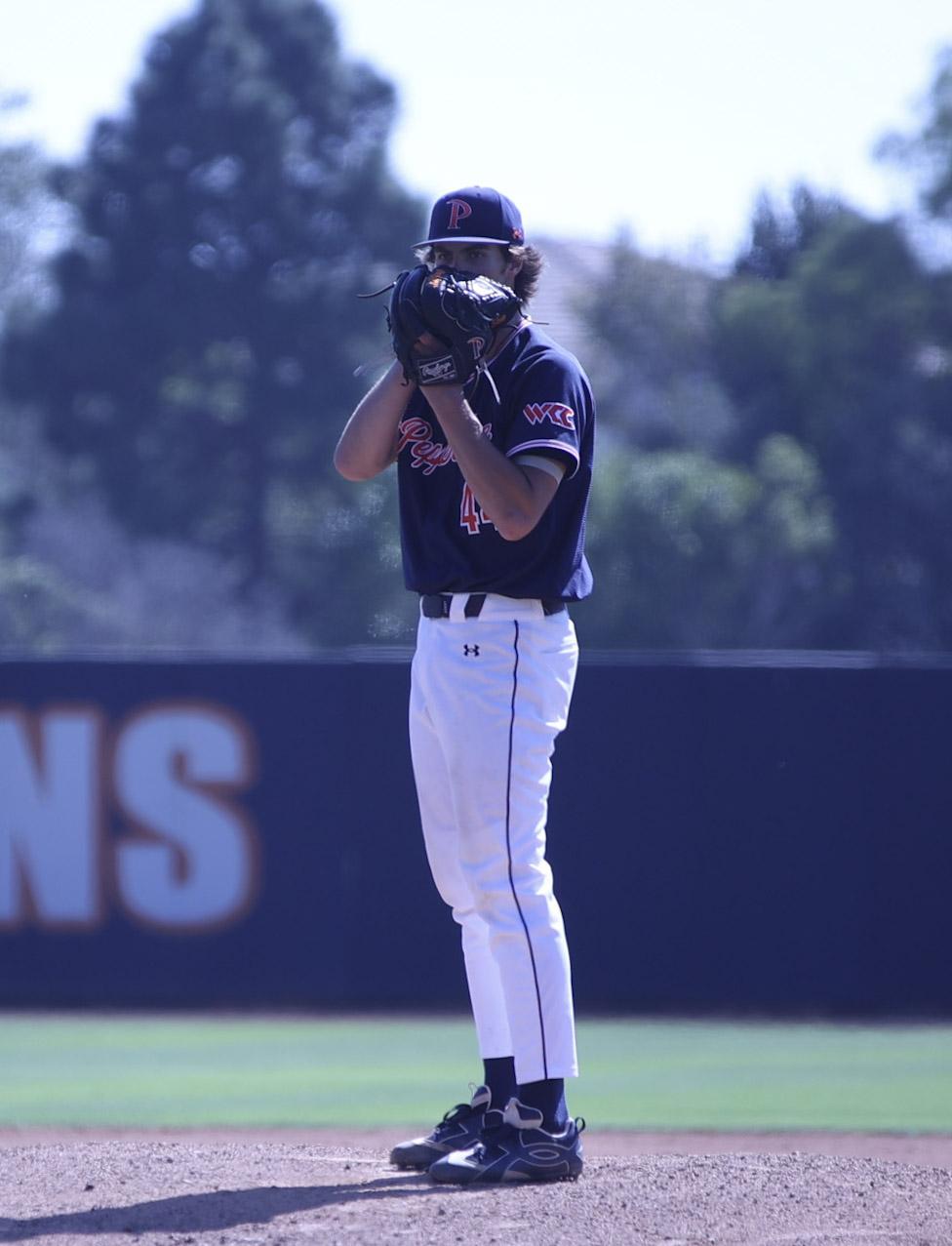 Senior right-handed pitcher Dylan Stewart stares down the opposing hitter against UMass Lowell on March 14. Stewart recorded 4 strikeouts in 3.2 innings during his appearance.